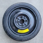 1991 Ford Escort Mercury Tracer Oem Spare Tire T115/70D14 14X4 Used. Price: $89.99.