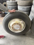 Double Coin 295/75R22.5 All Steel Radial Truck Tire On 10-LUG Rim Retread. Price: $250.00.