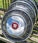 Set 1967-1978 Cadillac Eldorado Wheel Covers Hubcaps Shiny & Sharp Red Emblems Used. Price: $1099.95.