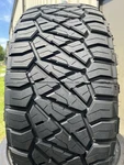 New Nitto Ridge Grappler 285/45R22 114Q DOT.1422 13/32. Price: $379.99.