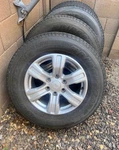 Four (4) Bridgestone Dueler 255/65R17 110T Tires And Ford Oem 17-INCH Alloy Used. Price: $300.00.