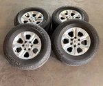 Set Of Used 75153 '05-'23 Toyota 4RUNNER Silver Wheels 265/70R17 Dunlop AT20 Lt. Price: $895.00.