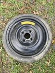 Yokohama Convenience Spare Donut Tire And Rim - T105/70D14 84M Lug Pattern Used. Price: $79.95.