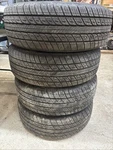 Set Of 4 Used High Tread Uniroyal Tiger Paw Touring A/s 215/60R16 95H 10/32. Price: $424.00.